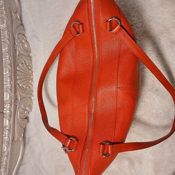 Coach Tyler Tote in an orange/red shade of pebbled leather. - Picture 3 of 16